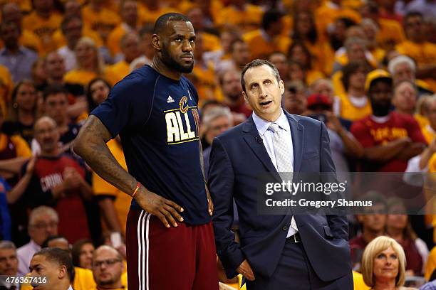 Head coach David Blatt of the Cleveland Cavaliers speaks to LeBron James late in the fourth quarter against the Atlanta Hawks during Game Four of the...