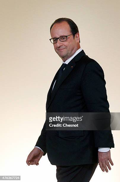 French President Francois Hollande leaves after his press conference with President of Chile Michelle Bachelet at the Elysee Palace on June 08 in...