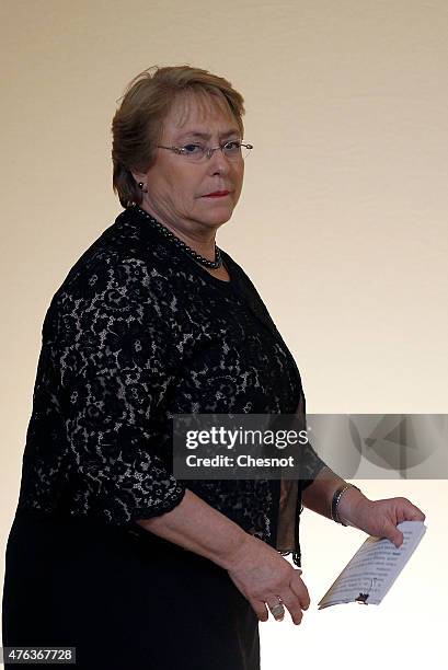 President of Chile Michelle Bachelet arrives to attend a press conference with French President Francois Hollande after their meeting at the Elysee...