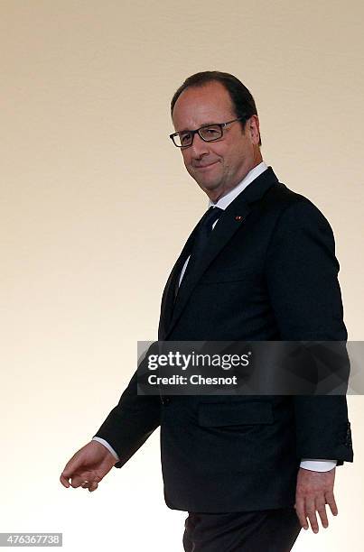 French President Francois Hollande leaves after his press conference with President of Chile Michelle Bachelet at the Elysee Palace on June 08 in...