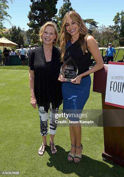 President of the SAG Foundation JoBeth Williams and honoree Sofia Vergara pose with the Inaugural Actors Inspiration Award at the Screen Actors Guild...