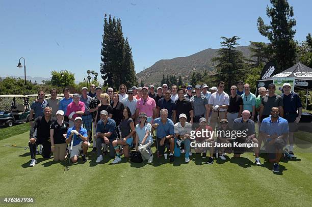 Attendees pose on the first tee at The Screen Actors Guild Foundation's 6th Annual Los Angeles Golf Classic on June 8, 2015 in Burbank, California.