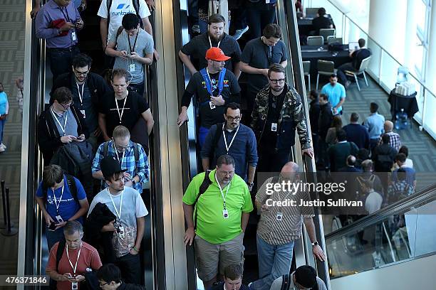 Attendees pack onto an escalator during the Apple WWDC on June 8, 2015 in San Francisco, California. Apple annouced a new OS X, El Capitan, iOS 9 and...