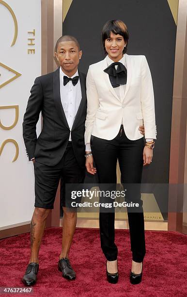 Singer Pharrell Williams and Helen Lasichanh arrive at the 86th Annual Academy Awards at Hollywood & Highland Center on March 2, 2014 in Hollywood,...