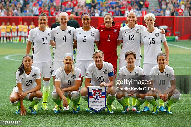 The United States poses for a team photo before the FIFA Women's World Cup 2015 Group D match against Australia at Winnipeg Stadium on June 8, 2015...
