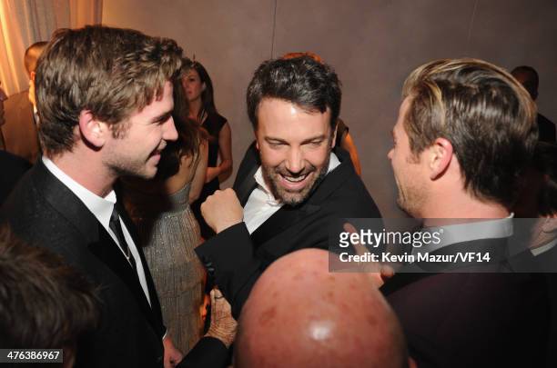 Liam Hemsworth, Ben Affleck and Chris Hemsworth attend the 2014 Vanity Fair Oscar Party Hosted By Graydon Carter on March 2, 2014 in West Hollywood,...
