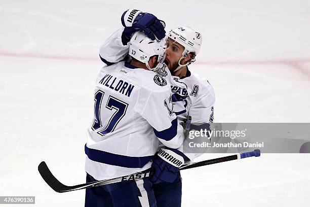 Ryan Callahan of the Tampa Bay Lightning celebrates with teammate Alex Killorn after scoring a goal on Corey Crawford of the Chicago Blackhawks in...