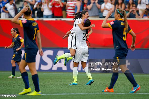Christen Press celebrates with Sydney Leroux of United States after Press scores a second half goal against Australia during the FIFA Women's World...
