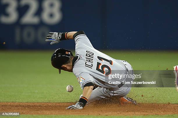 Ichiro Suzuki of the Miami Marlins steals second base in the fifth inning during MLB game action against the Toronto Blue Jays on June 8, 2015 at...