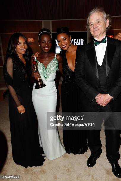 Actresses Regina Hall, Lupita Nyong'o, Gabrielle Union, and actor Bill Murray attend the 2014 Vanity Fair Oscar Party Hosted By Graydon Carter on...