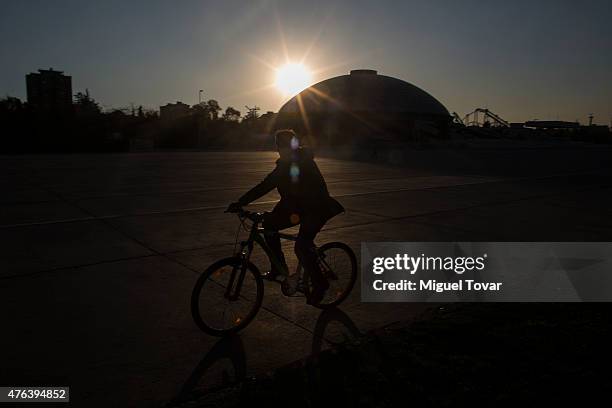 Man rides his bike at the O´Higgins Park in Santiago, host city of 2015 Copa America Chile on June 08, 2015 in Santiago, Chile.