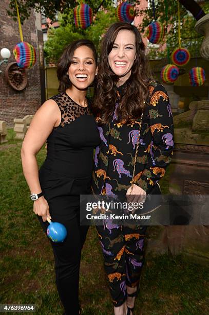 Alicia Keys and Liv Tyler attend the Stella McCartney Spring 2016 Resort Presentation on June 8, 2015 in New York City.