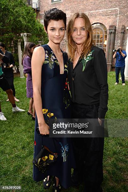 Stella McCartney and model attend the Stella McCartney Spring 2016 Resort Presentation on June 8, 2015 in New York City.