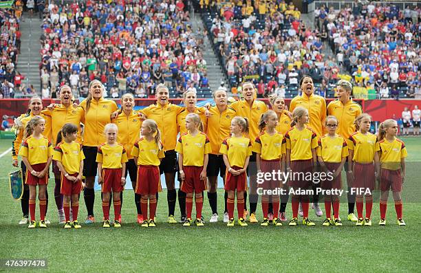 Team Australia sing the National Anthem before the FIFA Women's World Cup Canada 2015 Group D match between Sweden and Nigeria at Winnipeg Stadium on...