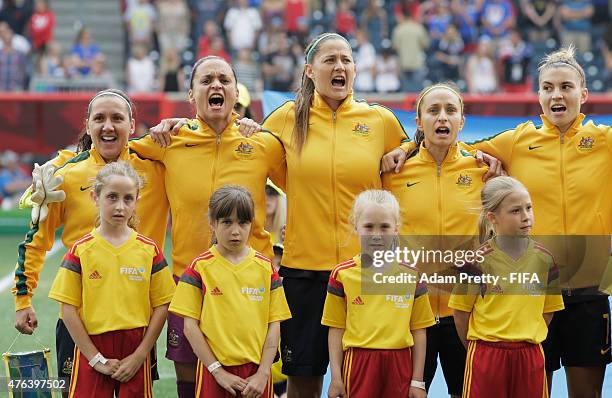 Team Australia sing the National Anthem before the FIFA Women's World Cup Canada 2015 Group D match between Sweden and Nigeria at Winnipeg Stadium on...