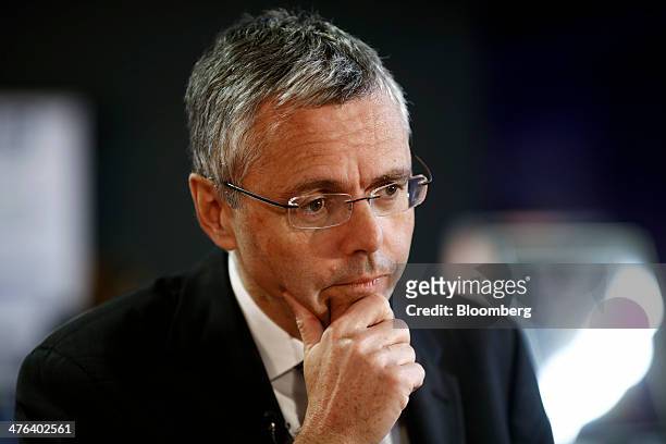 Michel Combes, chief executive officer of Alcatel-Lucent SA, pauses during a Bloomberg Television interview on the opening day of the Mobile World...