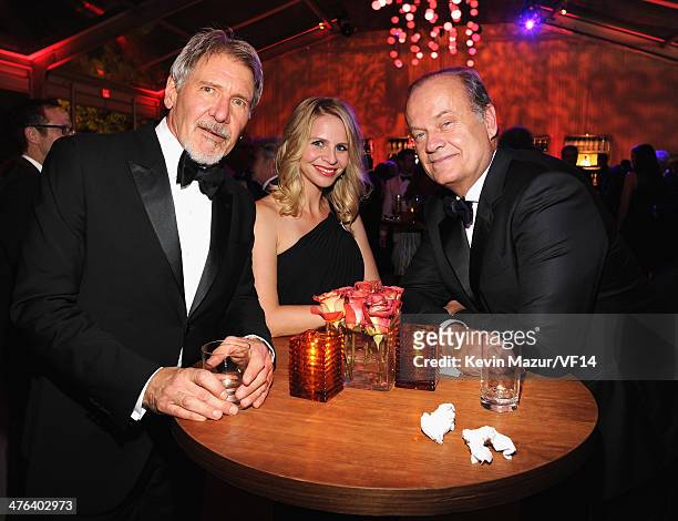 Harrison Ford, Kayte Walsh and Kelsey Grammer attend the 2014 Vanity Fair Oscar Party Hosted By Graydon Carter on March 2, 2014 in West Hollywood,...