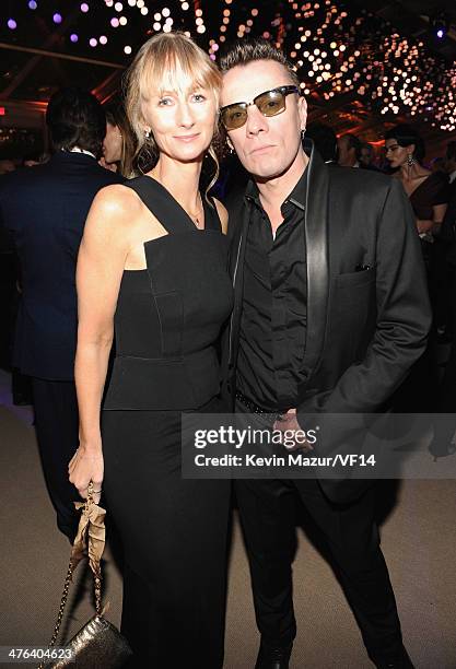 Ann Acheson and Larry Mullen, Jr. Attend the 2014 Vanity Fair Oscar Party Hosted By Graydon Carter on March 2, 2014 in West Hollywood, California.