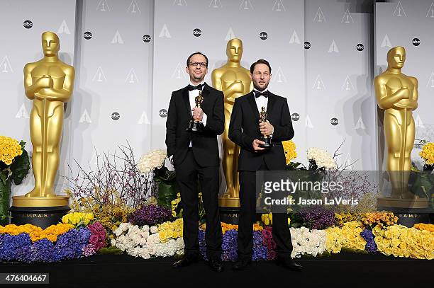 Filmakers Laurent Witz and Alexandre Espigares pose in the press room at the 86th annual Academy Awards at Dolby Theatre on March 2, 2014 in...