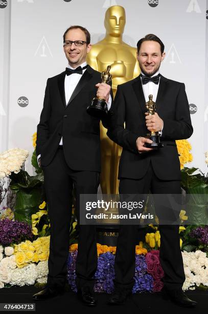 Filmakers Laurent Witz and Alexandre Espigares pose in the press room at the 86th annual Academy Awards at Dolby Theatre on March 2, 2014 in...