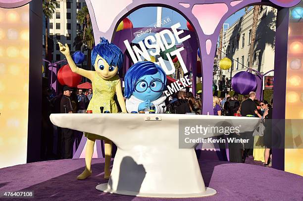 Film characters Joy and Sadness attend the Los Angeles premiere of Disney-Pixar's "Inside Out" at the El Capitan Theatre on June 8, 2015 in...