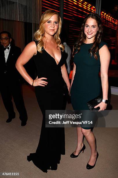 Actor/comedienne Amy Schumer and guest attend the 2014 Vanity Fair Oscar Party Hosted By Graydon Carter on March 2, 2014 in West Hollywood,...