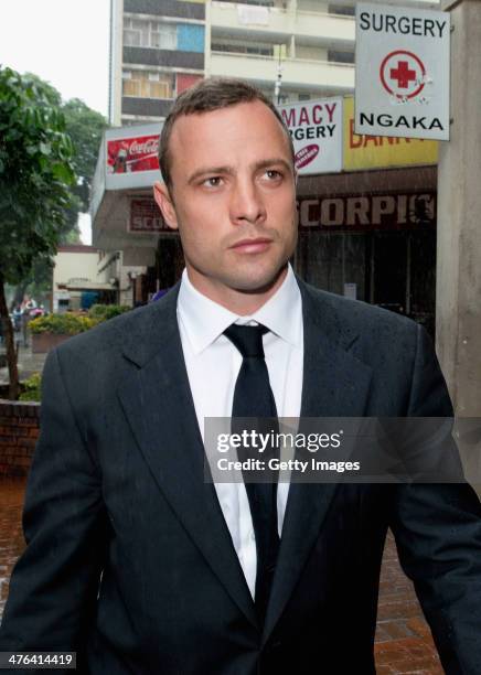 Oscar Pistorius leaves North Gauteng High Court during the lunchtime break as he faces trial accused of the murder of his girlfriend Reeva Steenkamp...