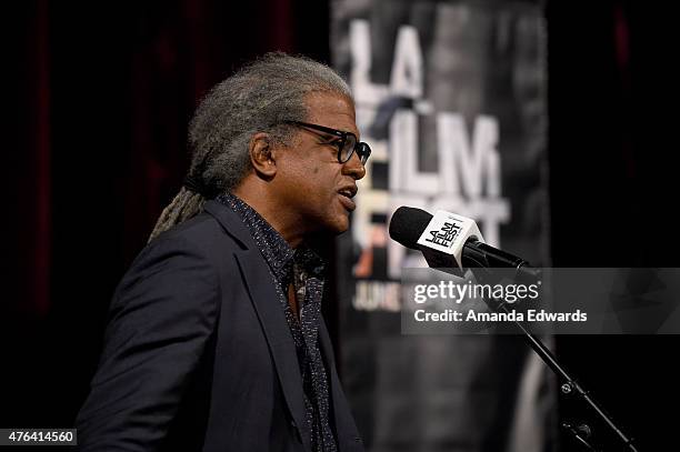 Film Independent Curator Elvis Mitchell speaks onstage at the Los Angeles premiere of "Dope" in partnership with the Los Angeles Film Festival at...