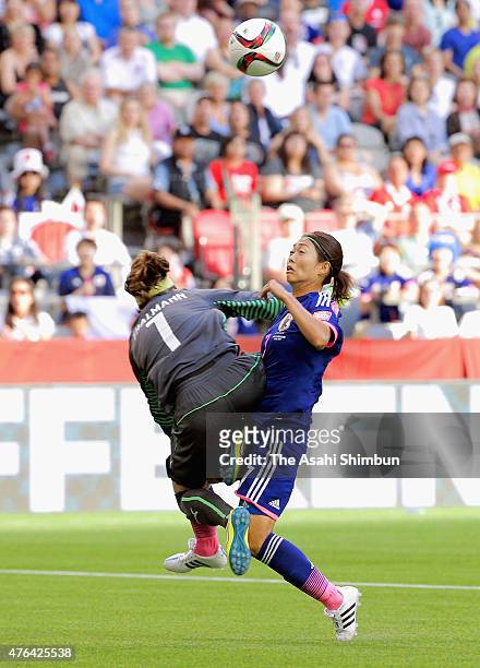 Goalkeeper Gaelle Thalmann of Switzerland fouls Kozue Ando of Japan and gives away a penalty during the FIFA Women's World Cup 2015 Group C match...
