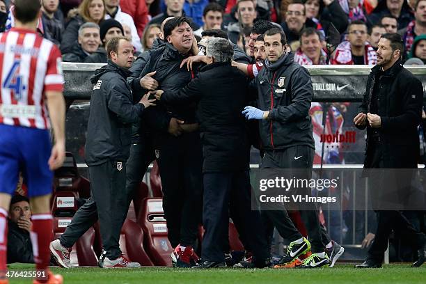 Assistant trainer German Adrian Burgos, Referee Carlos Delgado during the Spanish Primera División match between Atletico Madrid and Real Madrid at...