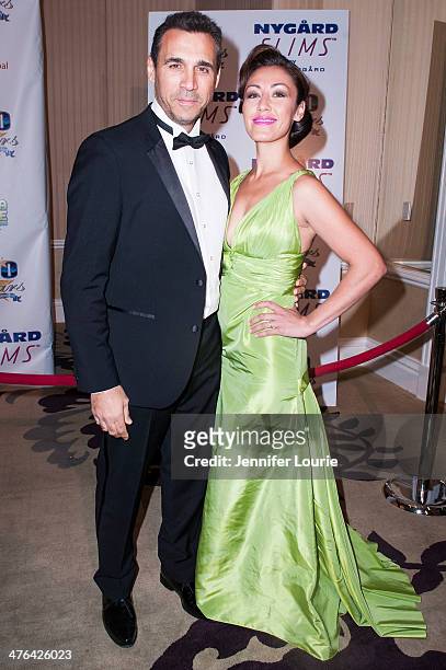Actor Adrian Paul and actress Meilani Paul attends Norby Walters' 24nd Annual Night of 100 Stars Oscar Viewing Gala at Beverly Hills Hotel on March...
