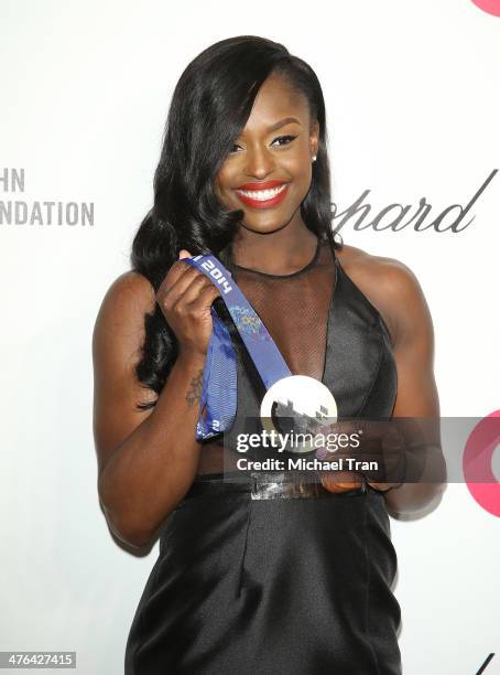 Aja Evans arrives at the 22nd Annual Elton John AIDS Foundation's Oscar viewing party held on March 2, 2014 in West Hollywood, California.