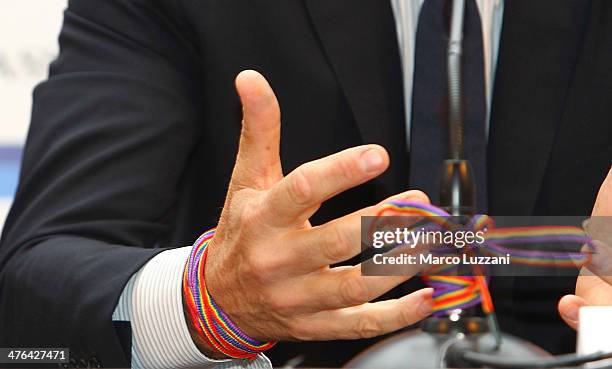 Italy coach Cesare Prandelli wears as bracelet the rainbow shoelace of campaign against omofobia during an unveiling of the new Italy team kit at...