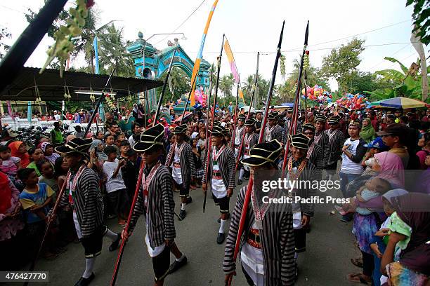 Residents dressed in traditional Javanese followed Nyadran ritual in Sewu Cemetery. Nyadran ritual is a tradition to clean up and pray to their...