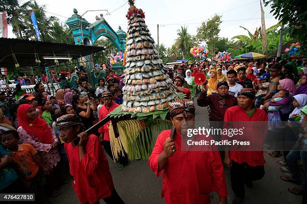 Residents dressed in traditional Javanese followed Nyadran ritual in Sewu Cemetery. Nyadran ritual is a tradition to clean up and pray to their...