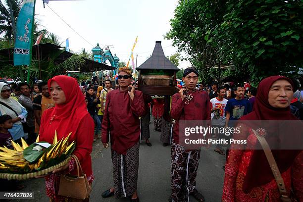 Residents dressed in traditional Javanese followed Nyadran ritual in Sewu Cemetery. Nyadran ritual is a tradition to clean up and pray to their...