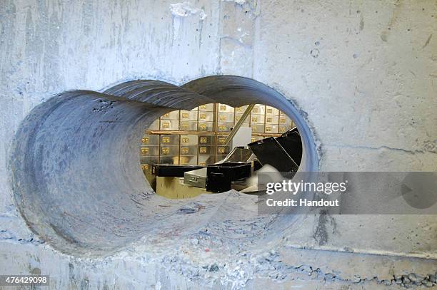 This handout image supplied by the Metropolitan Police, shows a view of the hole drilled in the vault wall at Hatton Garden Safe Deposit Limited...