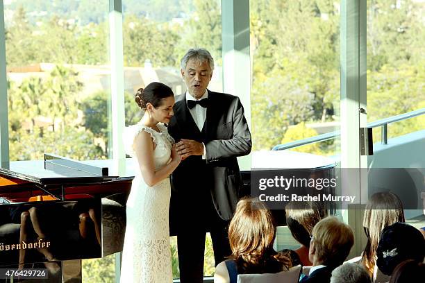 Soprano Maria Aleida and Maestro Andrea Bocelli perform a private concert for guests during Alfred Mann Foundation's an Evening Under The Stars with...