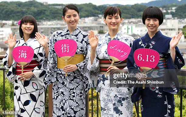 Actresses Suzu Hirose, Masami Nagasawa, Haruka Ayase and Kaho wearing yukata, Japanese summer kimono, pose for photographs during the 'Umimachi Diary...