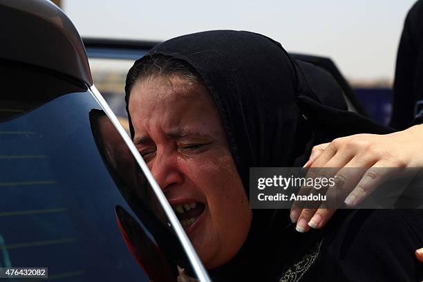 Relative of one of the victims of Port Said massacre cries after the trial of Port Said case in Cairo, Egypt on June 9, 2015. An Egyptian court on...