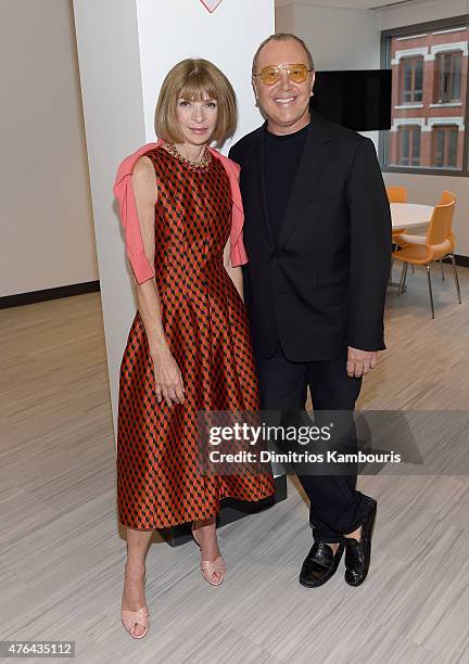 Anna Wintour and Michael Kors attend the celebration of God's Love We Deliver returning to Soho with a dedication of the new Michael Kors building on...