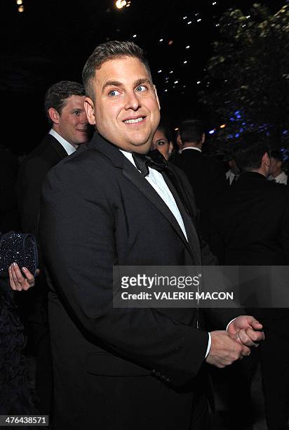 Nominee for Best Actor In A Supporting Role in "The Wolf of Wall Street" Jonah Hill arrives at the Governor's Ball following the 86th Academy Awards...