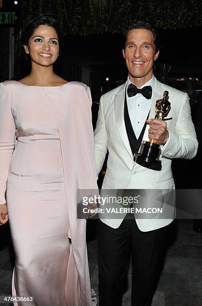 Best Actor Oscar winner Matthew McConaughey and wife Camila Alves arrive at the Governor's Ball following the 86th Academy Awards on March 2nd, 2014...
