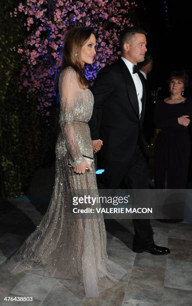 Actors Angelina Jolie and Brad Pitt arrive at the Governor's Ball following the 86th Academy Awards on March 2nd, 2014 in Hollywood, California. AFP...