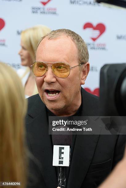 Michael Kors attends the celebration of God's Love We Deliver returning to Soho with a dedication of the new Michael Kors building on June 9, 2015 in...