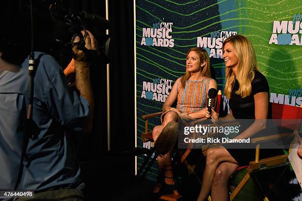 Actress Brittany Snow and sportscaster Erin Andrews speak during the 2015 CMT Music Awards Press Preview Day at the Bridgestone Arena on June 9, 2015...