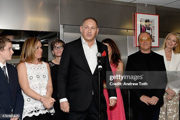 John Demsey speaks onstage with Cooper Endicott, Melissa Rivers, Nancy Mahon, Karen Pearl, Michael Kors and Blaine Trump during the celebration of...