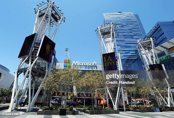 In this handout photo provided by AEG/Microsoft Theater, A general view of the exterior at Microsoft Theater as new signage is installed on June 9,...