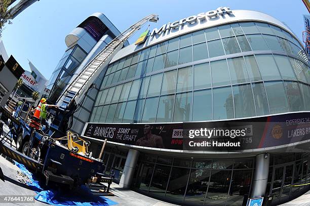 In this handout photo provided by AEG/Microsoft Theater, A general view of the exterior at Microsoft Theater as new signage is installed on June 9,...