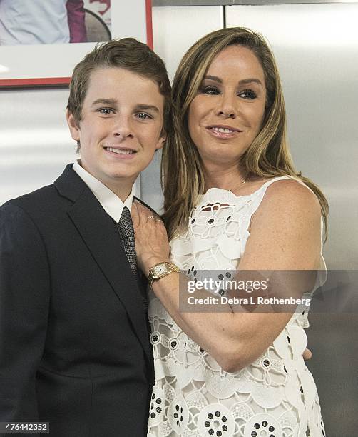 Cooper Endicott and his mother, Melissa Rivers, attend the celebration of God's Love We Deliver returning to Soho with a dedication of the new...
